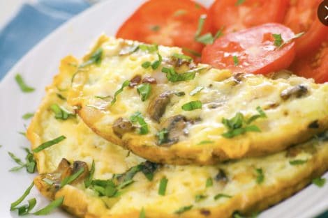 Healthy light weight omelette with mushrooms and tomatoes