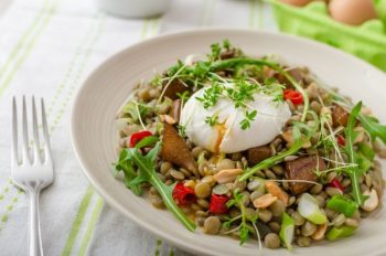 Lentil Salad with Quinoa and poached egg for a healthy meal